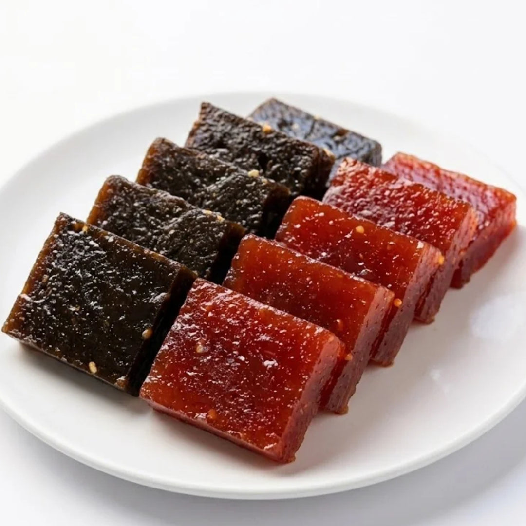 Black and red Kerala halwa pieces – combo close-up